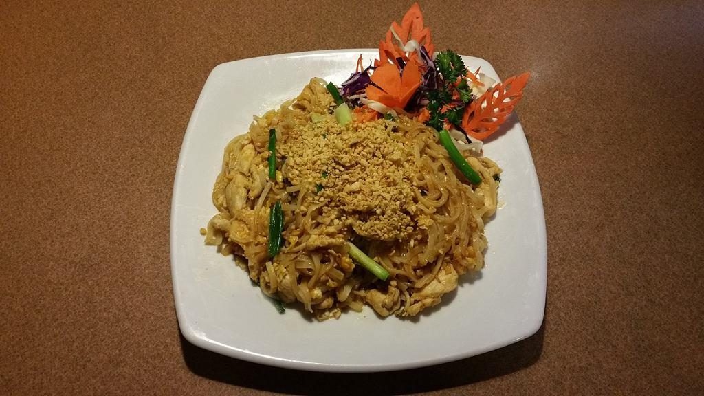 Pad Thai · Most famous stir fried Thai rice noodles with egg, bean sprouts and green onions, topped with crushed peanut.