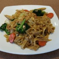 Pad See-Ew · Stir fried wide rice noodles with egg, broccoli, carrot in our delicious sweet black soy sau...