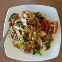 Pad Kee Mao (Drunken Noodles) · Stir fried wide rice noodles with chili, bell pepper, onions, broccoli, tomatoes and basil l...