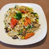 Veggie Fried Rice · Stir fried steamed jasmine rice with egg and mixed vegetable.