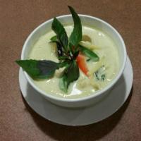 Green Curry (Kang Keow Wan) · Green curry paste, coconut milk, bamboo shoot, bell pepper, egg plant and basil leaves.