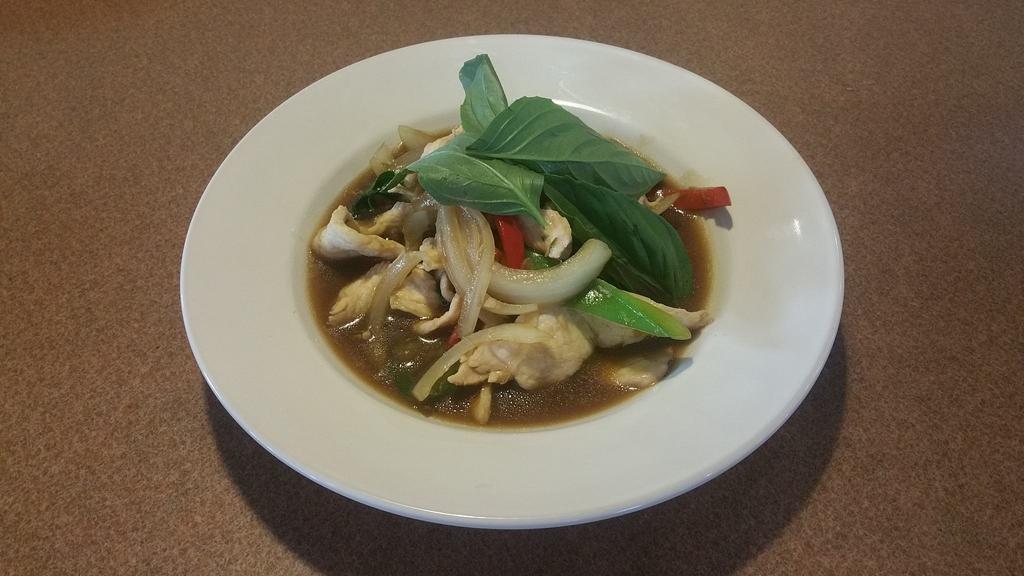 Spicy Basil · Stir fried fresh chili and garlic with onions, bell pepper, and basil leaves in house special sauce.