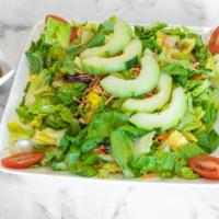 Small Garden Salad · Crisp salad with romaine lettuce, red cabbage, julienned carrots, sliced cucumbers and grape...