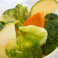 Steamed Veggies · A medley of cabbage, zucchini, broccoli, & carrots
