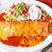 Burrito Supreme · Our most popular burrito, large flour tortilla, smothered with burrito sauce, filled with yo...
