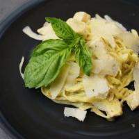 Pesto Cream Chicken Penne · Fresh locally made Carso’s penne pasta with a light pesto cream sauce and tender sautéed chi...