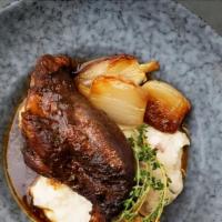 Stewed Lamb Shank · Slow-braised tender lamb shank with shallot confit, roasted garlic mashed red potatoes and m...