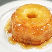 Pineapple Upside-Down Cake · An old-fashioned dessert featuring a moist buttery cake, a sweet pineapple ring, and a cream...