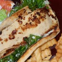 Chicken Gyros · Thinly sliced layers of perfectly seasoned chicken breast with lettuce, onions, tomatoes, an...