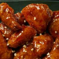 Gang-Jeong Chicken · Spicy & sweet traditional korean gang-jeong sauce mixed with crispy chicken.