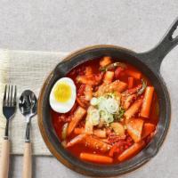 Spicy Dukk Bokki · Traditional korean spicy rice cakes, vegetables, fish cake and egg.