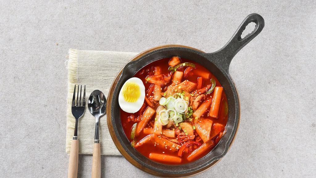 Spicy Dukk Bokki · Traditional korean spicy rice cakes, vegetables, fish cake and egg.