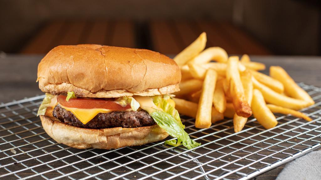 Cheeseburger · Two sliced American cheese, lettuce, tomato and sauce.