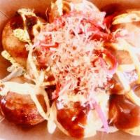 Takoyaki · Japanese octopus dumplings.
