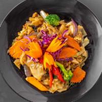 Pad Kee Mao · Wide rice noodles with sweet Thai basil sauce, egg and house veggies.
