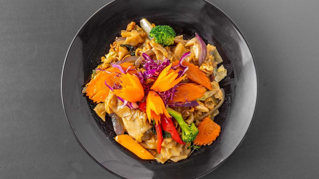 Pad Kee Mao · Wide rice noodles with sweet Thai basil sauce, egg and house veggies.