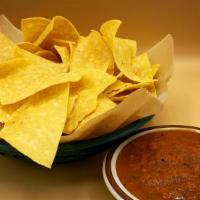 Chips And Salsa · One of our classic salsas and chips, rooster, chipotle pineapple, pasilla lime, tomatillo, o...
