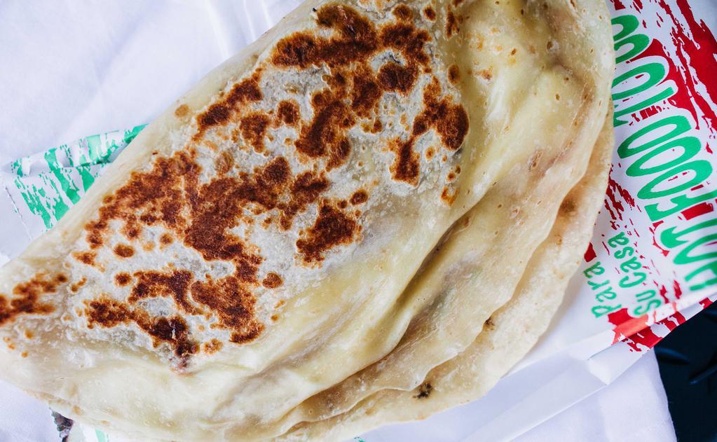 Cheese Quesadilla · Flour tortilla filled with mozzarella cheese and grilled.