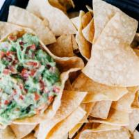 Chips & Guacamole · Freshly made chips with a side of freshly made guacamole.