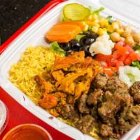 Combo Plate · Lamb, beef, chicken, falafel. Served with rice, salad, tzatziki, and bread.