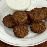 Falafel (Each) · Vegetarian, gluten-free. Homemade with garbanzo beans, fava beans, and vegetables.