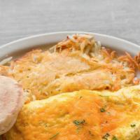 Cheese Omelet · Three eggs,  and shredded cheese. Served with toast and hash brown.