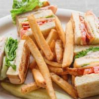 Clubhouse · A classic triple decker with turkey, ham, bacon, lettuce, tomato and mayo all between your c...