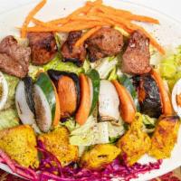 Mixed Grill · Made without gluten. A meat plate of chicken kabob and lamb kabob served with grilled onions...
