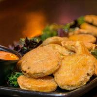 City Fried Pickles · Dill battered and golden fried pickles served with andalouse sauce.