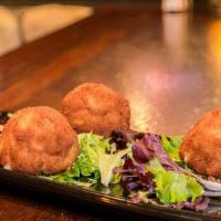 Mac And Cheese Balls · Rolled, fried golden, and served with a side of salsa ranch.
