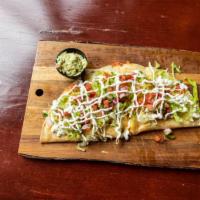 Pacific Avenue Quesadilla · Gigantic flour tortilla with chicken, bacon, ranch, green onions, Jack, and Cheddar cheese. ...