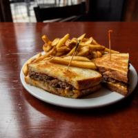 Mirror From Melt · Six ounce. Pressed chuck brisket beef patty smothered in caramelized onions, andalouse, Ched...