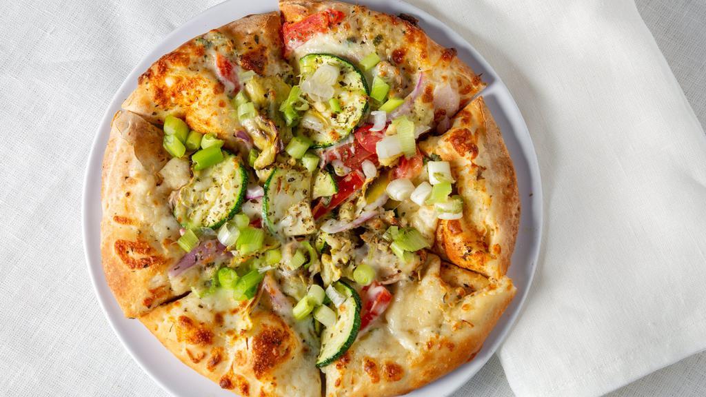California Veggie Pizza · White garlic sauce, spinach, tomatoes, red onions, mushrooms, artichoke hearts, Italian seasoning, & zucchini.