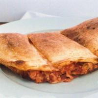 Calzones · you pick three toppings, (more for an additional charge) we placed them at the center of our...