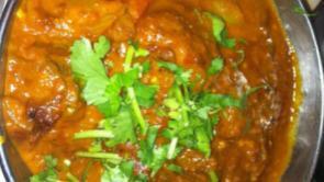 Vindaloo · Potatoes cooked in a sauce made of onions, tomatoes, garlic, ginger, vinegar & spices.