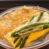 Ham & Asparagus Omelette · Diced ham, mushrooms, onions and cheddar cheese topped w/ grilled asparagus & hollandaise.