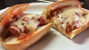 Chicken Parmesan · Homemade fried breaded chicken cutlets, smothered in house marinara sauce and baked with Moz...