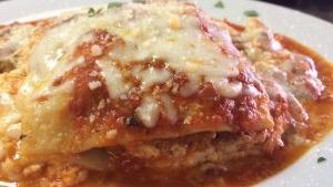 Lasagna Al Forno · Vito’s favorite. Layered lasagna pasta with seasoned ricotta, ground beef, mozzarella cheese...