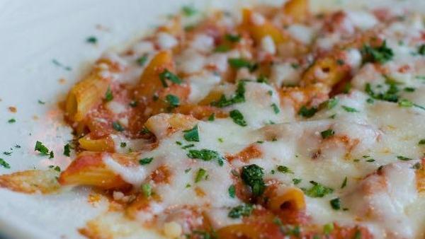Baked Ziti · Ziti pasta combined with ricotta, mozzarella cheese and house marinara sauce.