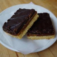 Ecstasy Bar · Layers of caramel and chocolate ganache on a shortbread crust.