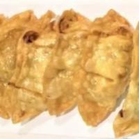 A-3. Gyoza (6 Pcs.) · Deep-fried meat and vegetable pot-stickers.