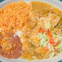 Combo #1 (Tamale Plate )  · Two tamales (red or green) smothered with green chili.