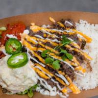 Bulgogi Plate · Marinated Korean beef, rice, green mix, cilantro, mayo, potato salad, jalapeño.