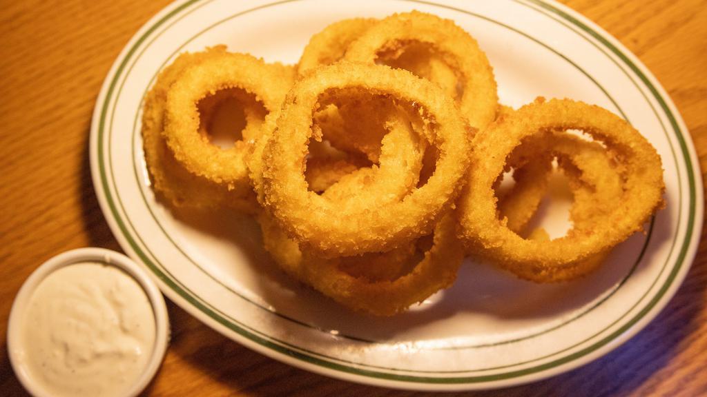 Onion Rings · Thick cut and fried golden with house ranch dressing.