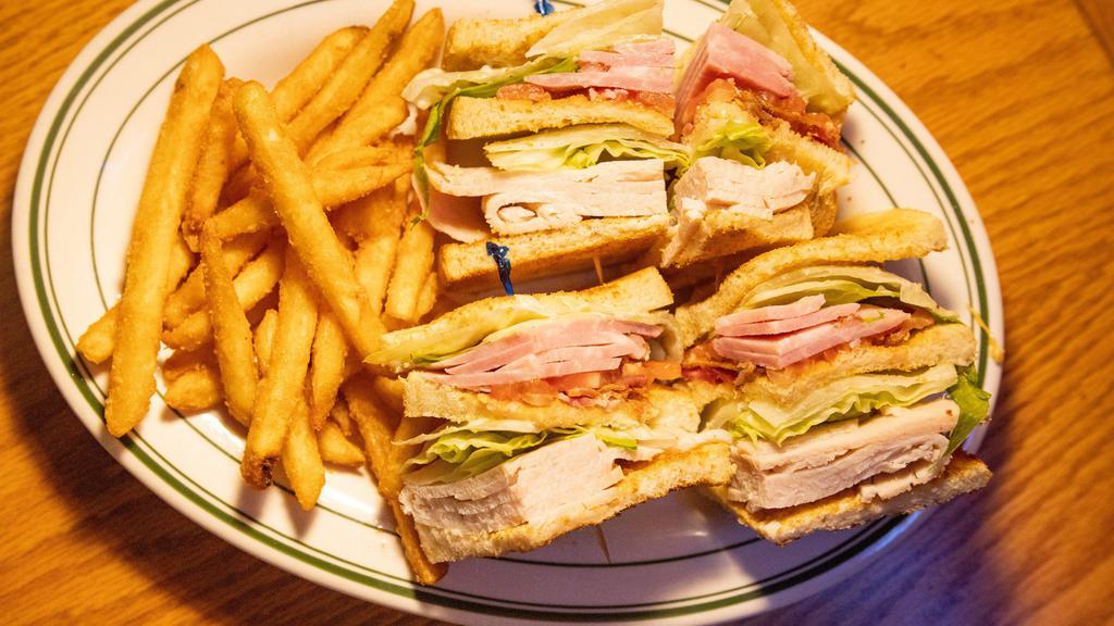 Clubhouse Sandwich · This sandwich offers corned beef, swiss cheese, sauerkraut and thousand island on grilled rye bread.