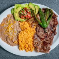 Carne Asada Plate · Steak served with avocado, grilled onion, chile guero, pico de gallo and a side tortillas, r...