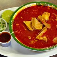 Menudo · Pancita (tripe) soup, served with tortillas, cilantro, onion, lemons and red sauce.