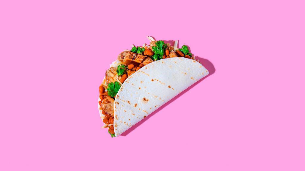 Meat And Bean Taco · Your choice of meat and BBQ beans with crunchy slaw, zesty salsa verde, and cilantro in a corn tortilla.