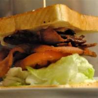 Blt Sandwich · A classic favorite for sandwich lovers. Four bacon strips, lettuce, and tomato on your choic...