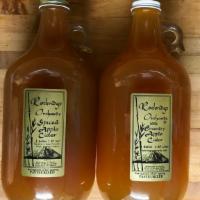 Spiced Cider · Half gallon cold-pressed pure apple cider of mixed apples with mulling spices.